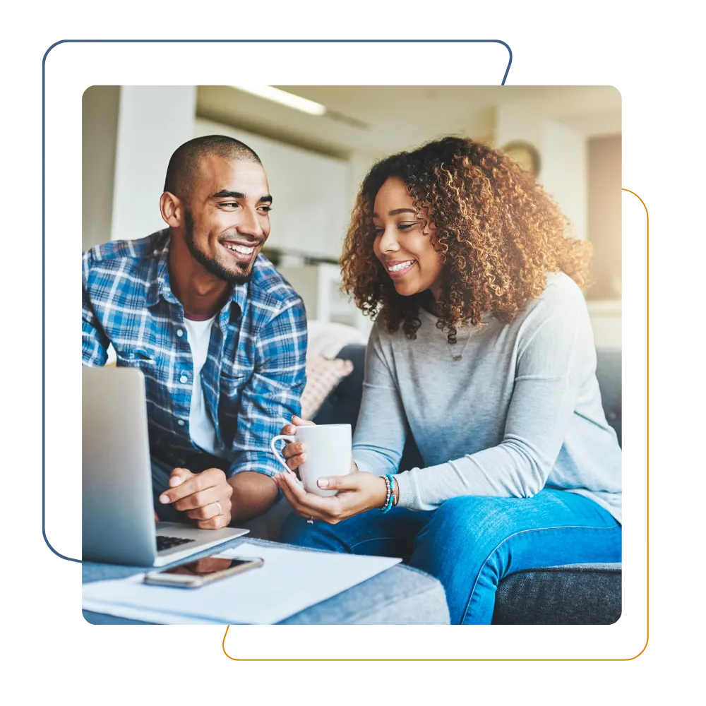 Home buyers reviewing home purchase loan options together